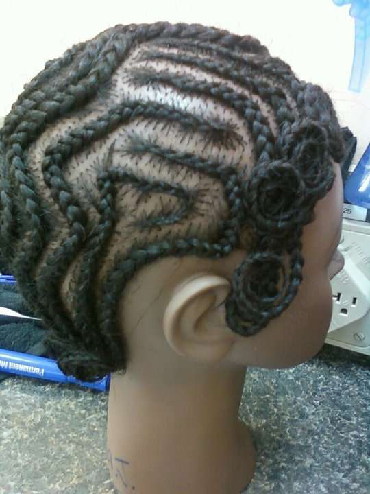 braided hair style with pin curls on a mannequin