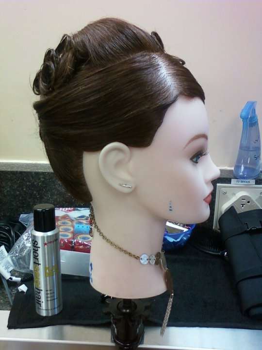 pin curls on a hair mannequin