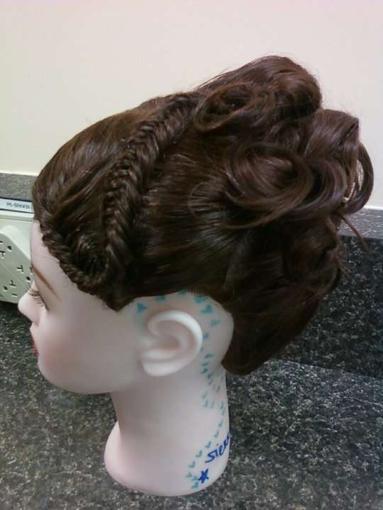 fish tail raid on a long hair mannequin with pin curls