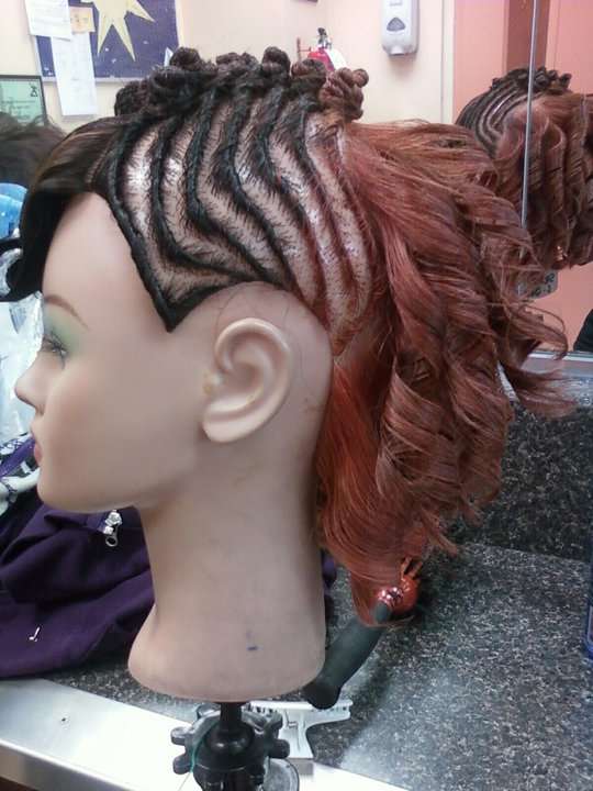 flat twist hairstyle with barrel curls on a mannequin