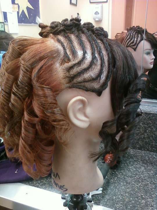 flat twist hairstyle with barrel curls on a mannequin