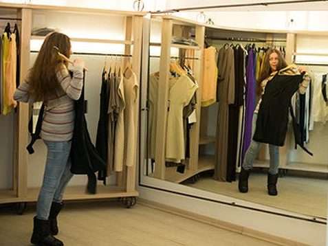 smart shopping in style, a lady trying on business casual attire