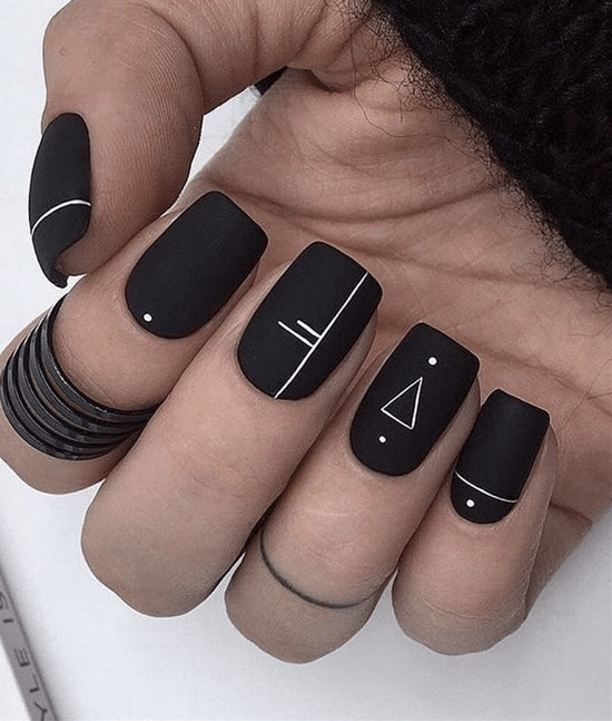 Black nails with lines, triangled and dotted geometric nail art design